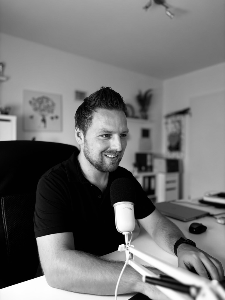 Sebastian recording at his home studio – native German content & localization expert